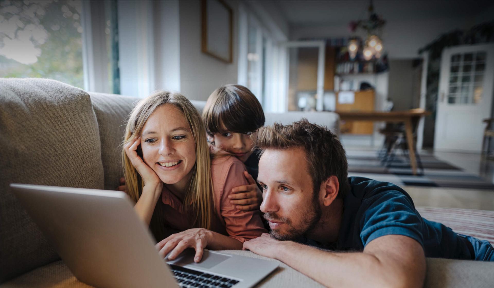 family on couch enjoying time together